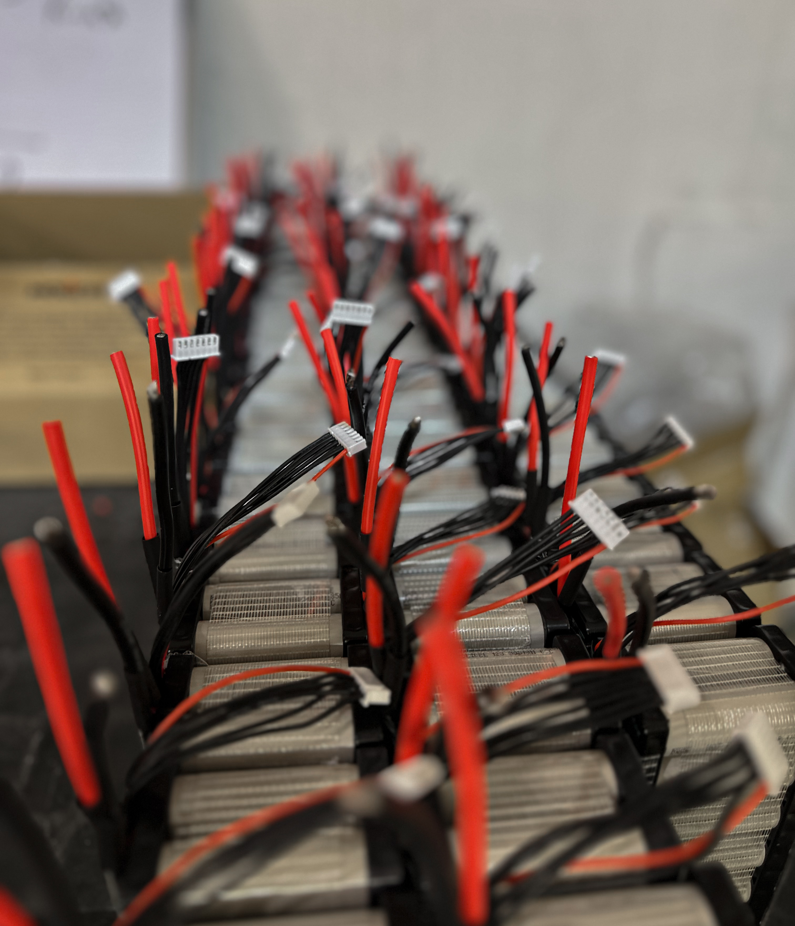 Rows of battery packs with balancer leads