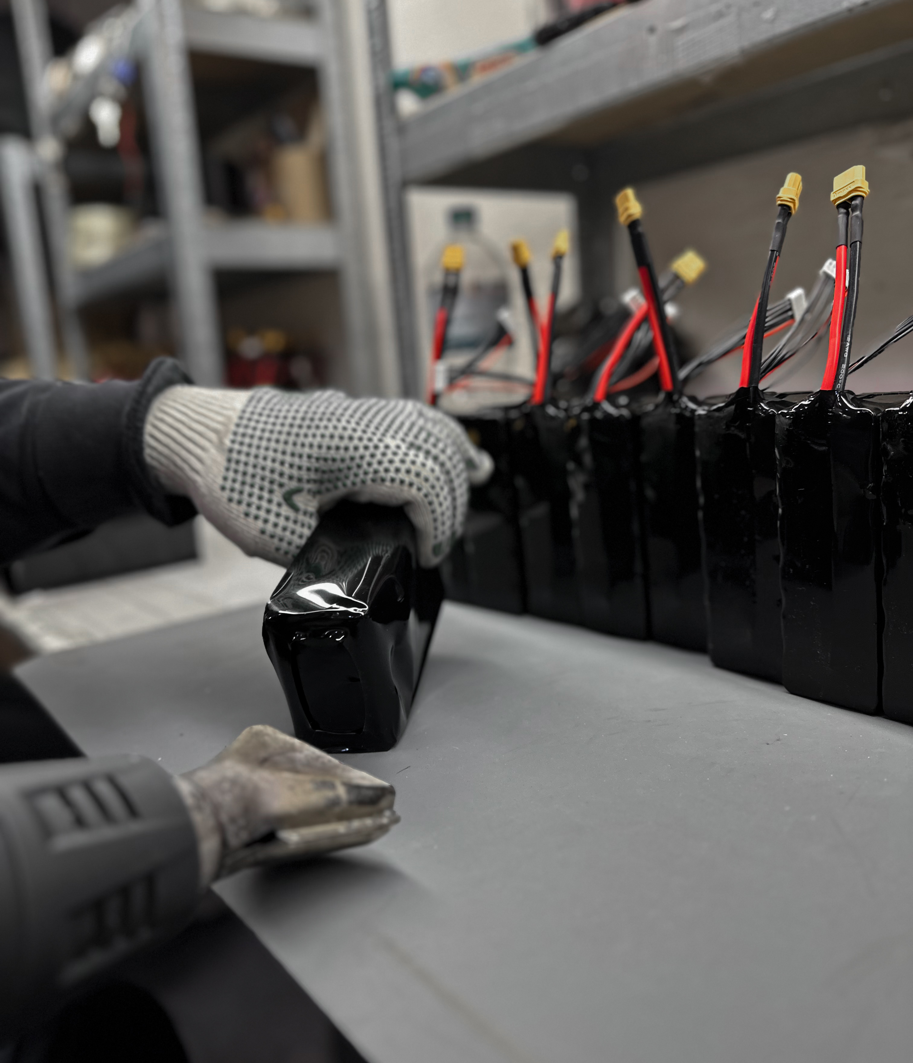 Heat-shrink sleeving on finished batteries